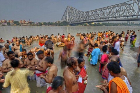 Devotees gathered near the ghats around Kalighat Temple in Kolkata