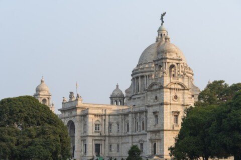 Side view of Victoria Memorial Hall in Kolkata, the white marble monument and museum on the Maidan