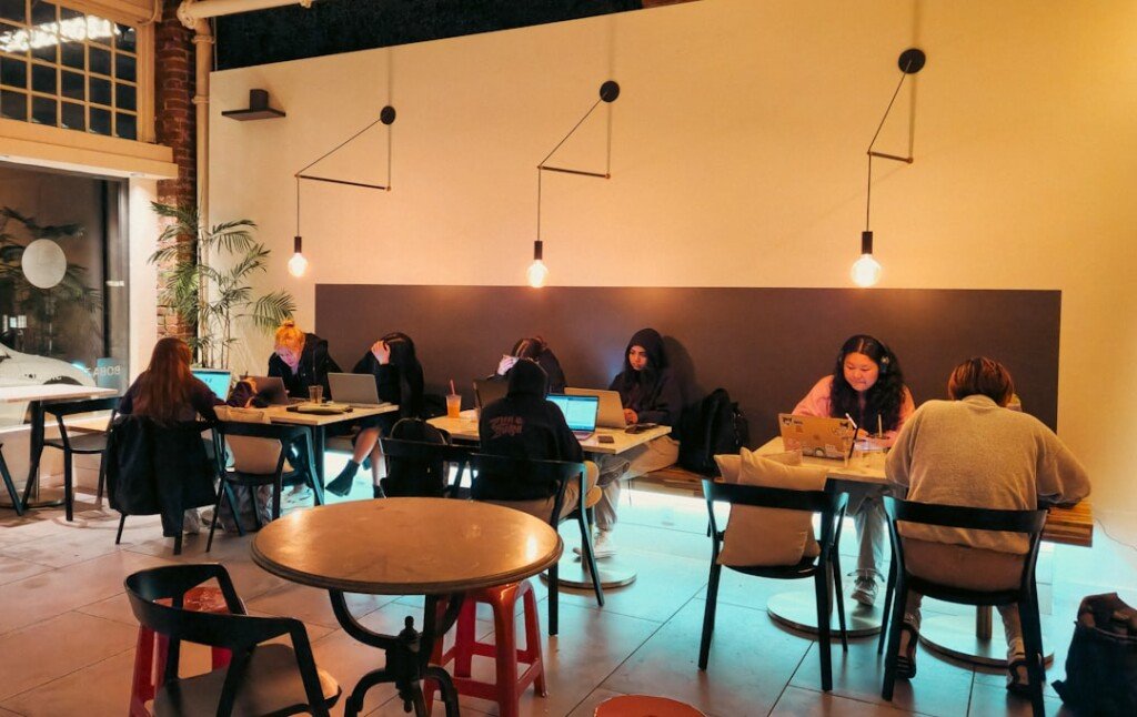 People working on laptops at a Wi-Fi-friendly cafe in Kolkata