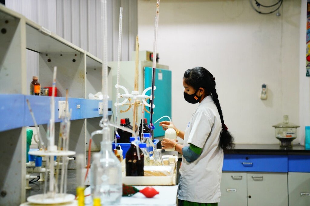 Science students working at a chemistry laboratory bench, representing B.Sc colleges in Kolkata