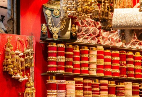 Gold necklaces and bangles displayed inside a traditional Indian jewellery shop, similar to the shops of the Bowbazar gold market in Kolkata