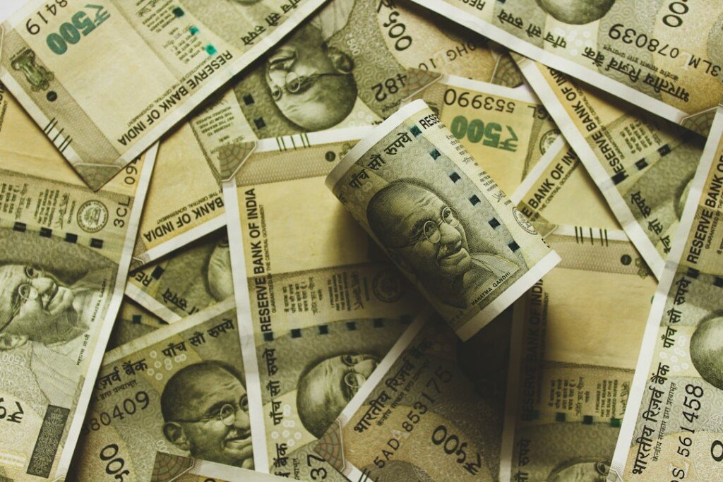 Indian rupee banknotes laid out, representing the monthly cost of living in Kolkata for students