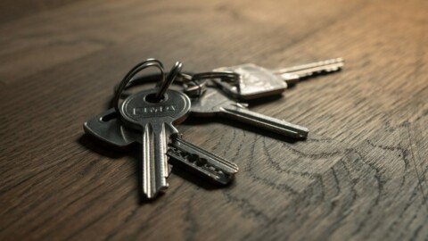 Set of keys on a table, representing PG room lock and safety checks for renters in Kolkata