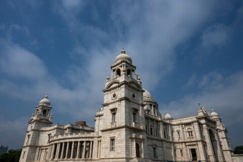 Grand white heritage college building with towers, representative of St Xavier's College Kolkata's historic Park Street campus