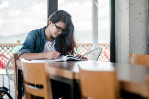 Student writing while preparing for JEE, NEET and WBJEE coaching in Kolkata