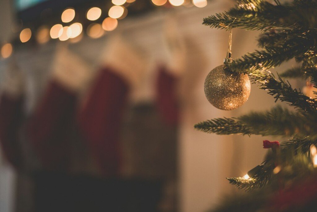 Close-up of glowing baubles and lights on a Christmas tree, a festive scene for Christmas in Kolkata