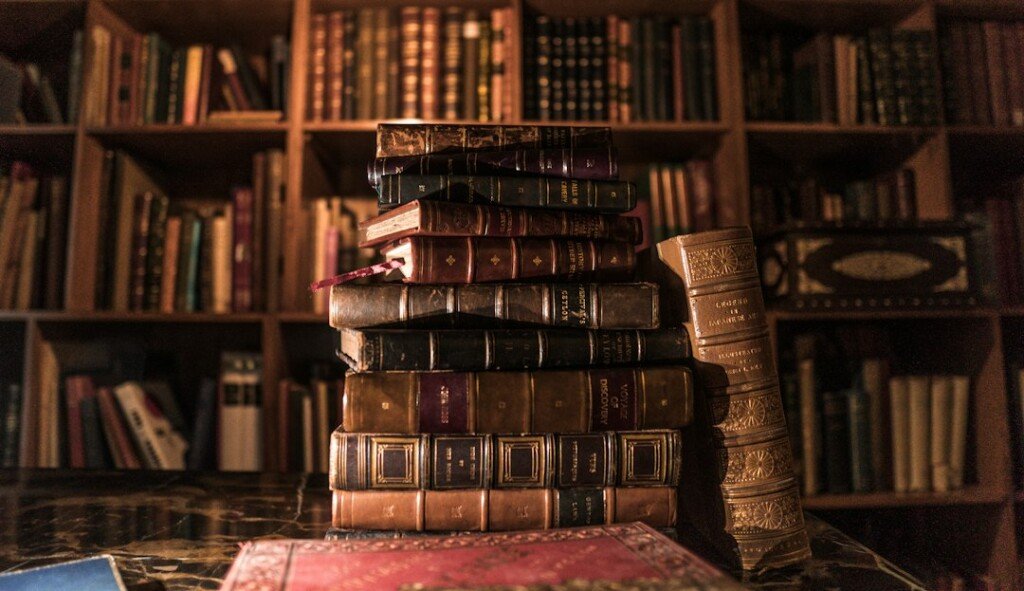 Shelves packed with old and second-hand books at a bookshop, similar to the stalls of the College Street book market in Kolkata